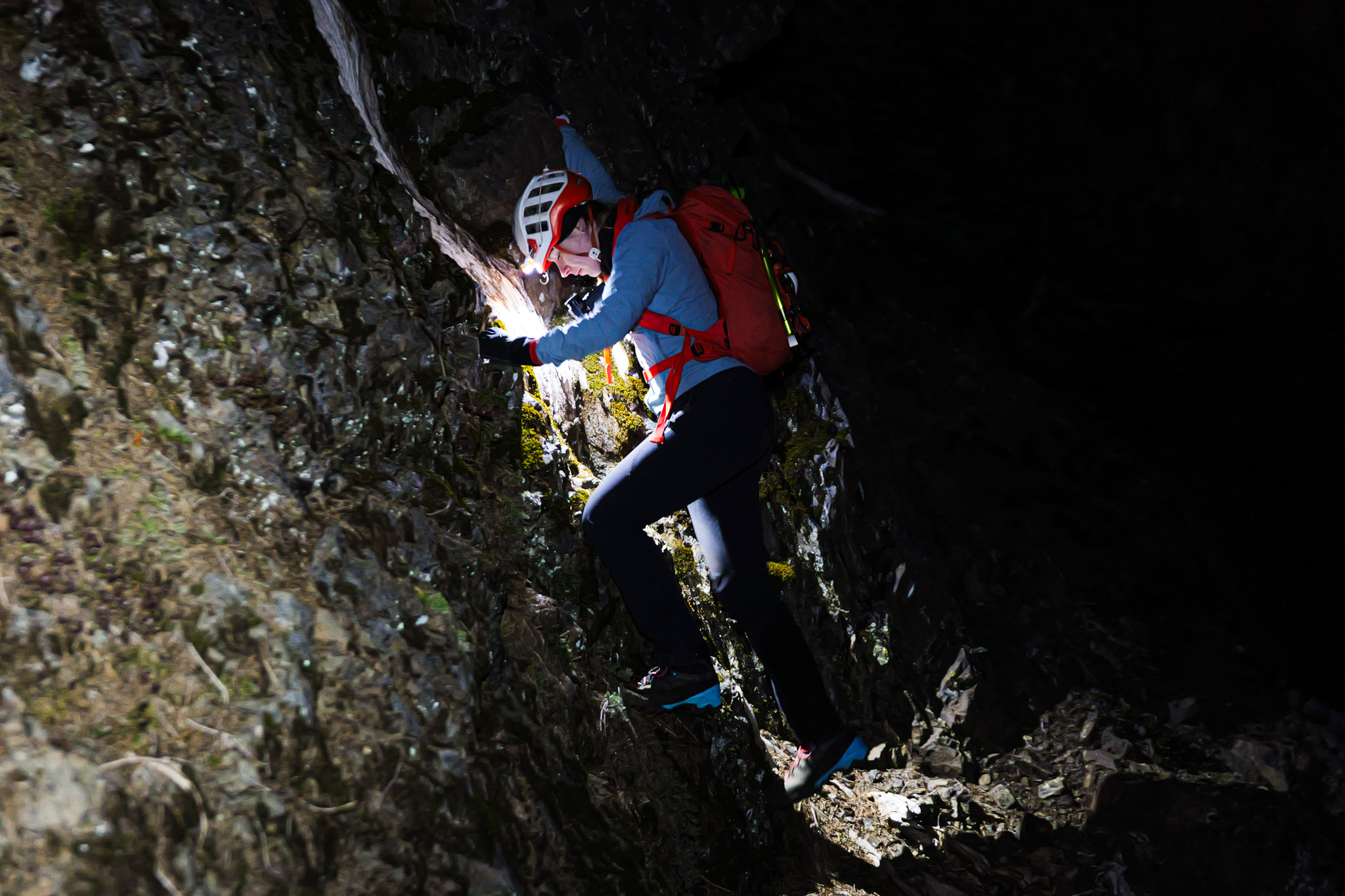 Night climbing on rock face
